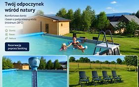 Domek w Górach Izerskich 4 i 6 osobowy, agroturystyka, żywe zwierzęta, w pełni wyposażone, plac zabaw dla dzieci, ognisko z kijkami i rusztem, ogrzewanie i klimatyzacja, latem basen